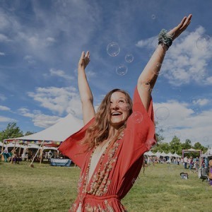 Woman dancing with bubbles
